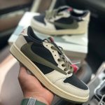 Close-up of Nike Air Jordan 1 Low Travis Scott Olive First Copy Shoes in hand