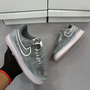 Premium quality Nike Air Force 1 Low Reigning Champ first copy shoes in grey suede with classic Air Force 1 design, available with cash on delivery from Martify