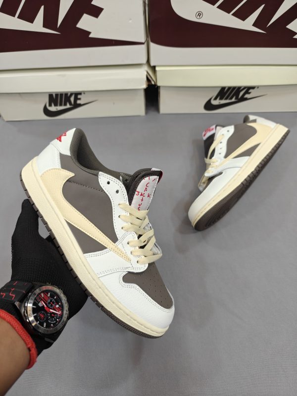 Premium quality Nike Air Jordan 1 Travis Scott Reverse Mocha first copy shoes with mocha, cream, and white colorway and reversed swoosh, available with cash on delivery from Martify