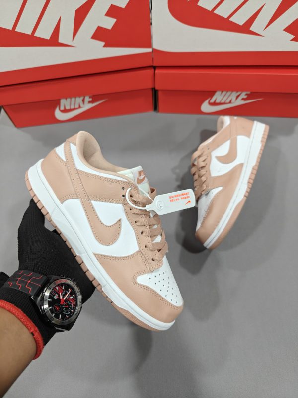 Premium quality Nike SB Dunk Low Rose Whisper first copy shoes in rose pink and white leather, classic Dunk silhouette, available with cash on delivery from Martify