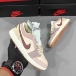 Premium quality Nike Air Jordan 1 Low Brown Sail first copy shoes in cream, brown, and pink colorway, available with cash on delivery from Martify