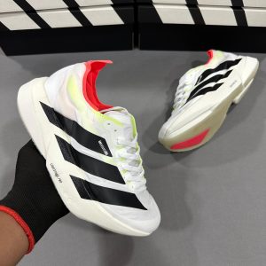 Premium quality Adidas Adizero Adios Pro 4 Black Red first copy shoes with bold stripes and neon red accents, available with cash on delivery from Martify