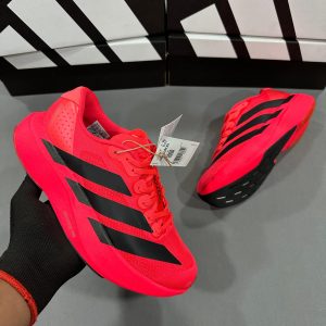 Premium quality Adidas Adizero Evo SL Red first copy shoes with bright red mesh and black stripes, available with cash on delivery from Martify