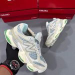 Premium quality New Balance 9060 Silver Metallic first copy shoes with shiny overlays, suede, and chunky sole, available with cash on delivery from Martify