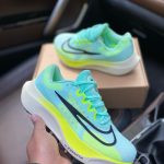 Premium quality Nike Zoom FLY 5 Aqua Blue first copy shoes with yellow-accented midsole and mesh upper, available with cash on delivery from Martify