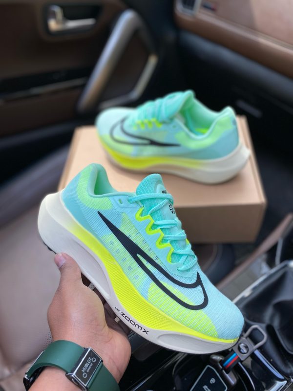 Premium quality Nike Zoom FLY 5 Aqua Blue first copy shoes with yellow-accented midsole and mesh upper, available with cash on delivery from Martify