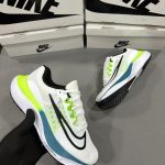 Premium quality Nike Zoom FLY 5 White first copy shoes with mesh upper, neon green accent, and dynamic sole, available with cash on delivery from Martify