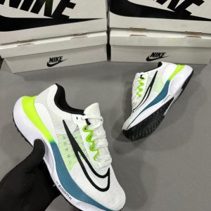 Premium quality Nike Zoom FLY 5 White first copy shoes with mesh upper, neon green accent, and dynamic sole, available with cash on delivery from Martify