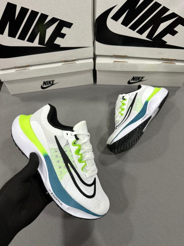 Premium quality Nike Zoom FLY 5 White first copy shoes with mesh upper, neon green accent, and dynamic sole, available with cash on delivery from Martify