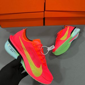 Premium quality Nike Vaporfly 4 Proto Orange first copy shoes with neon orange mesh and yellow swoosh, available with cash on delivery from Martify
